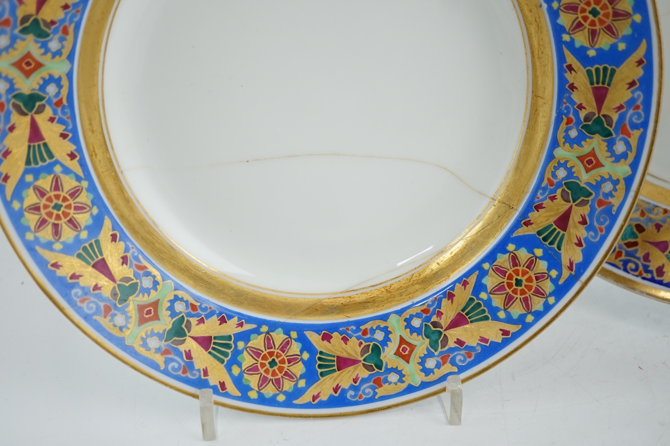 A pair of Nicholas II Imperial porcelain factory plates, from the Gothic service, green printed marks, 23.5cm diameter. Condition - poor to fair repairs